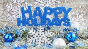 Picture of Happy Holidays greeting with ornaments and glitter