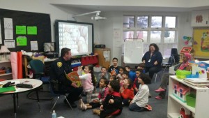 Officer Morandini reading to the students.