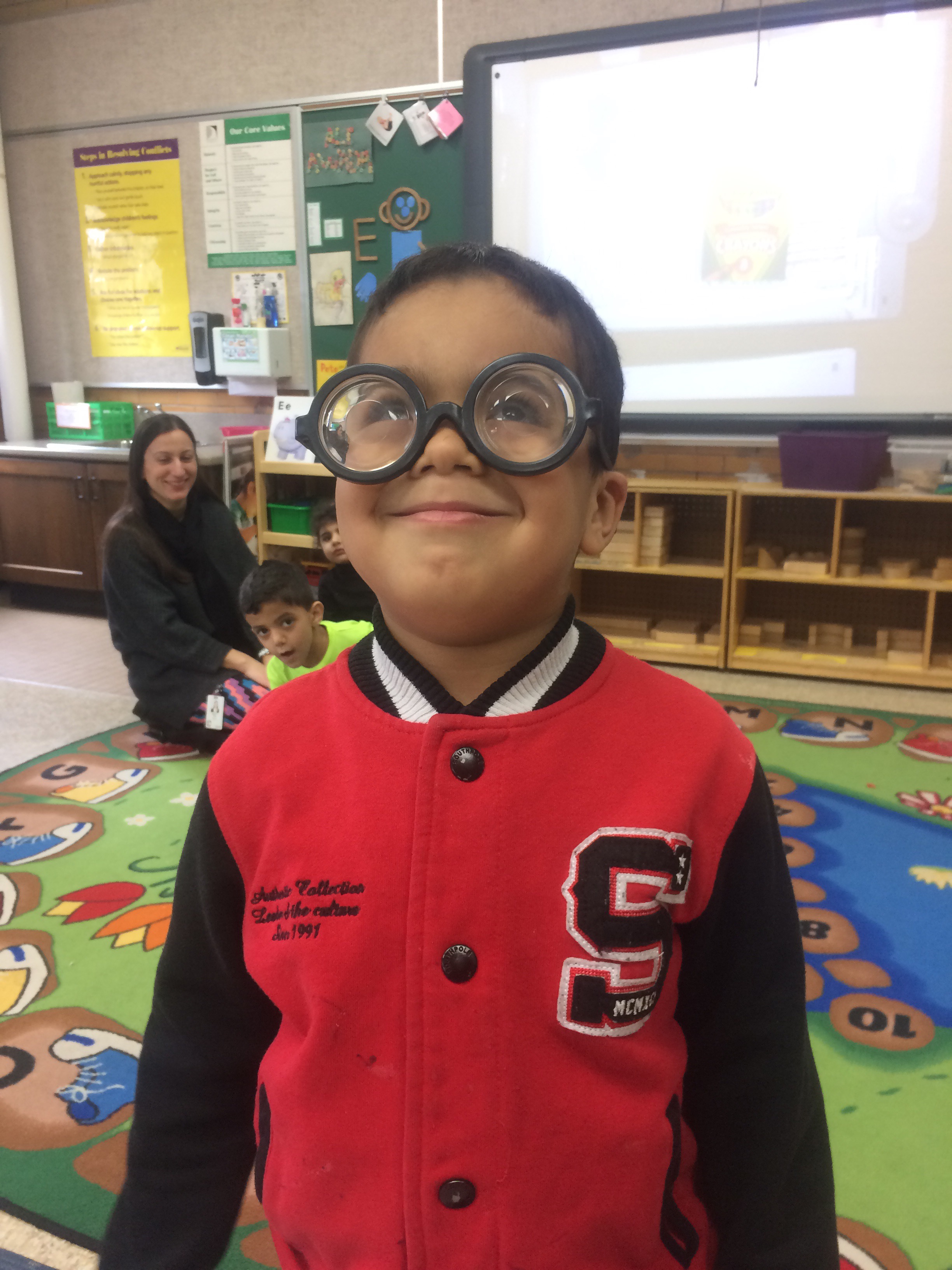 Our Pre-K classroom uses silly glasses to plan their work time activity.
