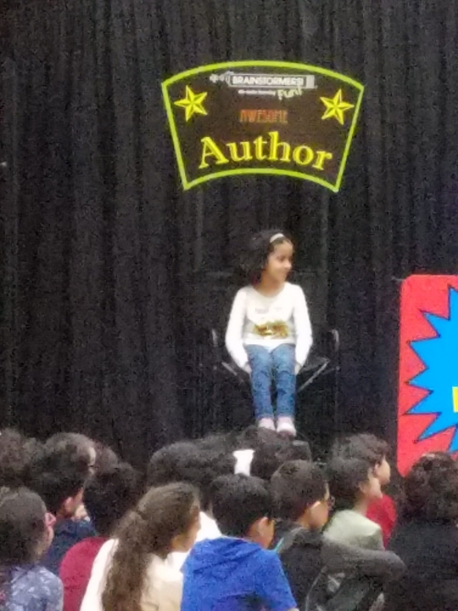 3rd grade Ihsan Qawasmi's in the author chair as her story was chosen