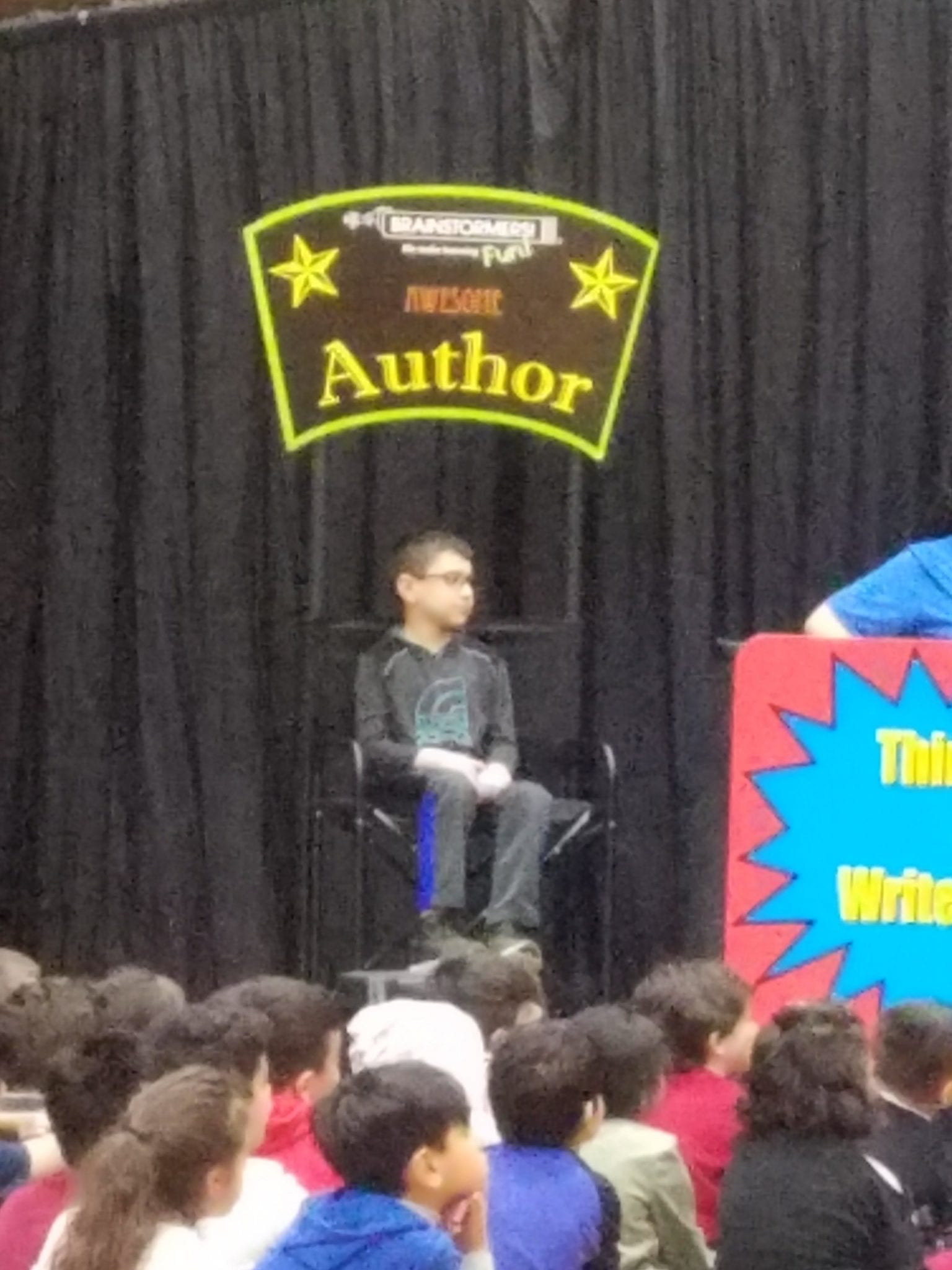 2nd grade Jaafar Obeid in the author chair as his story was chosen