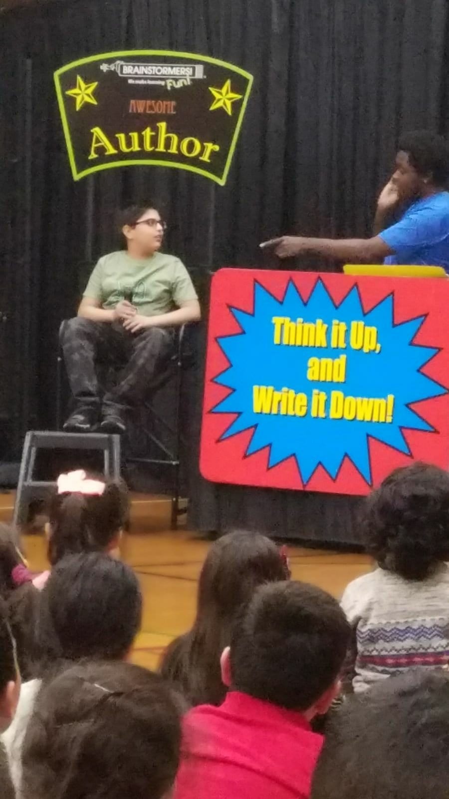 4th grader Jibreel Jadallah in the author chair as his story was chosen 