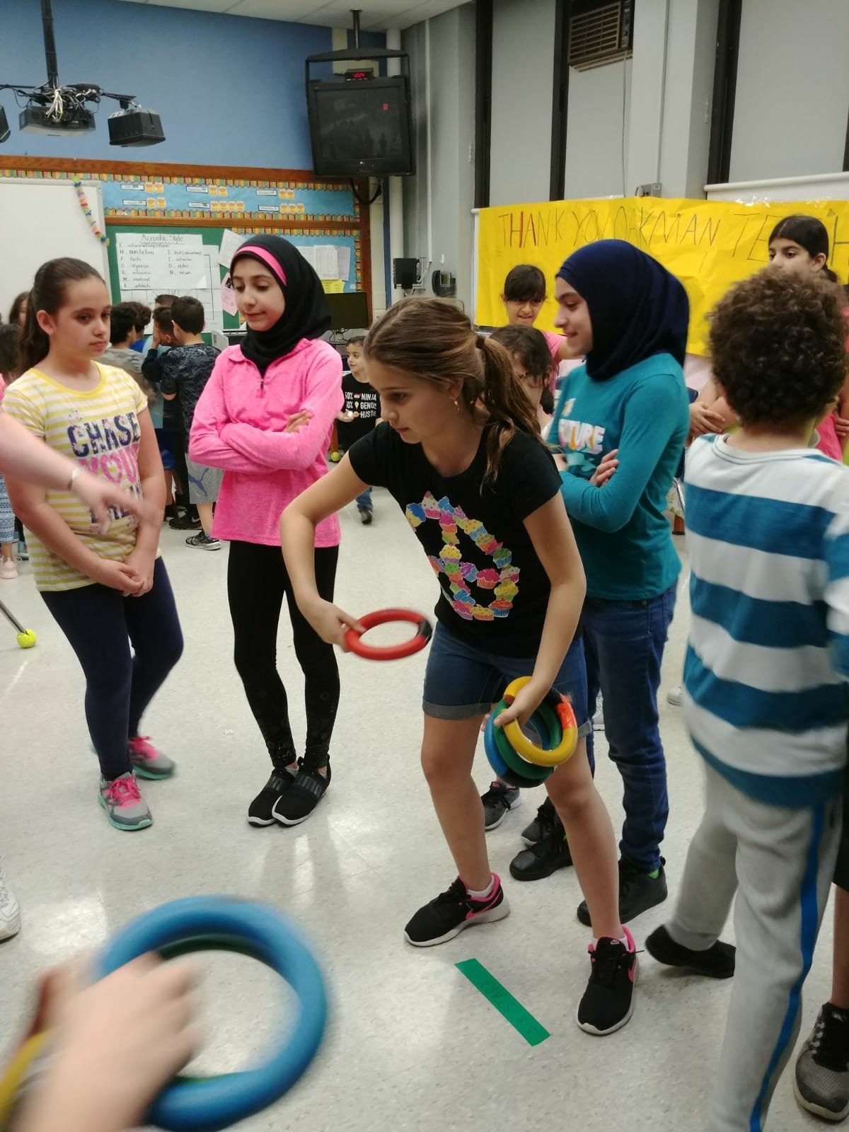 Students playing ring toss