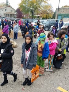 Students trick or treating