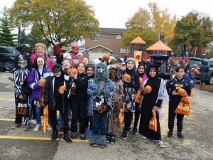Mrs. Gartha's 5th grade students posing in costume 