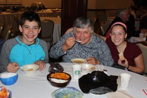Family Eating Soup