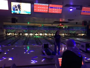 Bowling in the dark with a few lights. Rock and Bowl