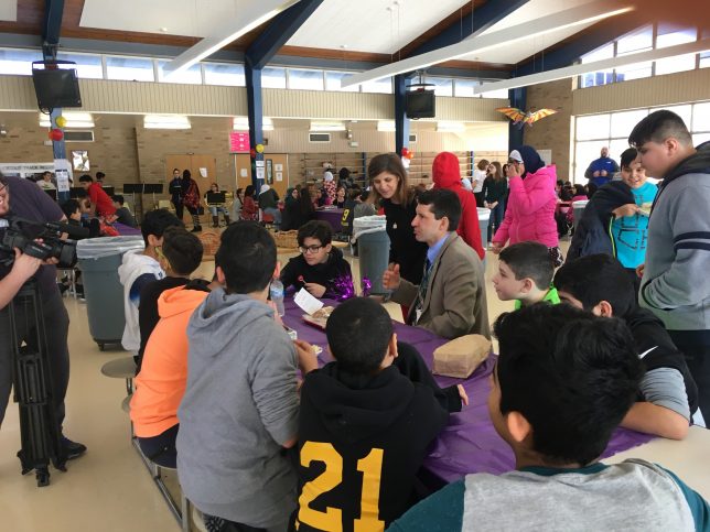 Superintendent eating lunch with students at Stout for No One eats alone