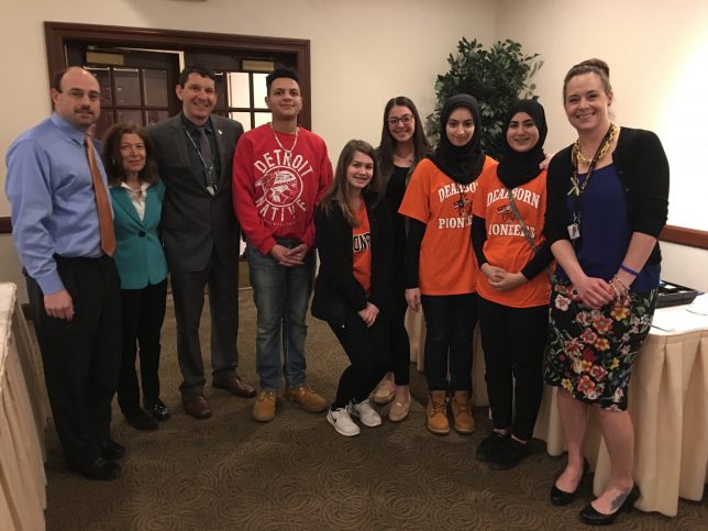 Group picture with students and adults at Rotary