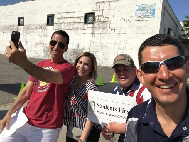 We took a selfie at the parade while Raad was doing a face book live post. 