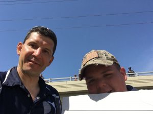 2 adults and a selfie at the parade