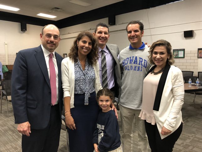 Newly appointed principal Linda Lazar with family, Trustees and the Superintendent at the board meeting