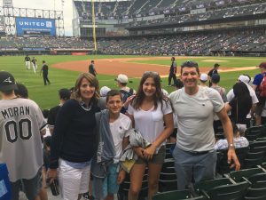 family of 4 picture at Guaranteed field in Chicago