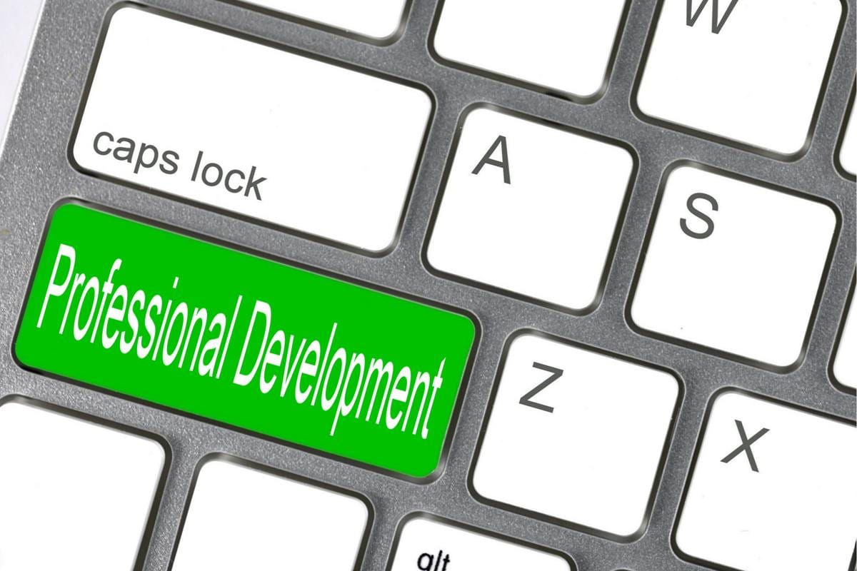 Keyboard with "Professional Development" written out as a key.